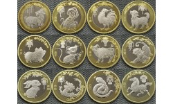 Набор из 12 монет 10 юаней Китай 2015-2025 гг.. Восточный гороскоп Набор из 12 монет 10 юаней Китай 2015-2025 гг.. Восточный гороскоп